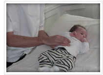 Baby receiving Osteopathic Treatment